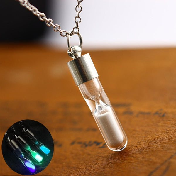 Necklace with glow-in-the-dark hourglass pendant