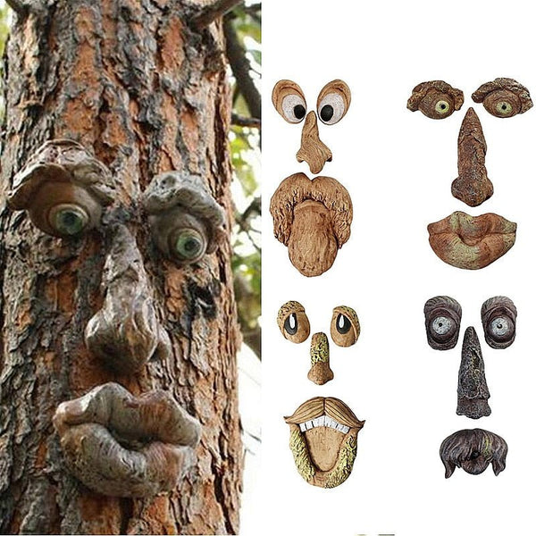 Funny garden decoration tree face old man