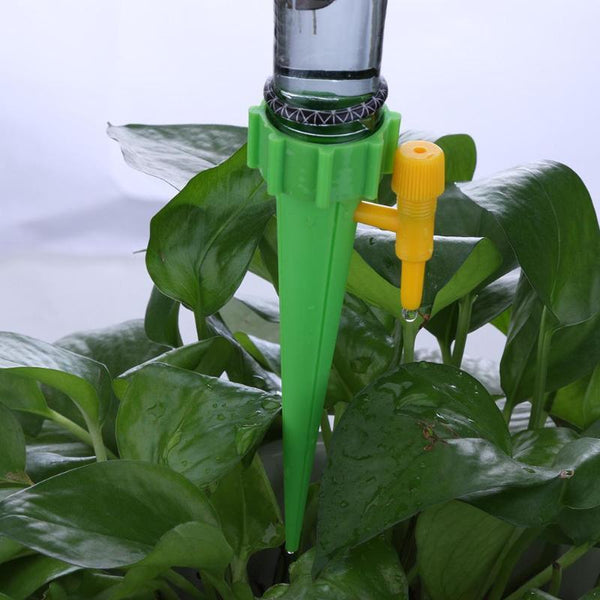 Drip irrigation system for water bottles